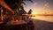 Restaurant on a paradise, exotic, sandy beach. Sunset