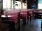 Restaurant with red booths