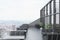 Restaurant on the roof, black sofas, cityscape