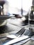 Restaurant scene, fork and knife on a clean table