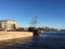 A restaurant ship moored in the Neva river near the Mytninskaya embankment in Saint Petersburg. Against a blue cloudless sky