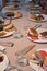 Restaurant table with children`s dishes after eating, leftovers