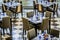 Restaurant table seatings with beautiful table settings with glassware, cutlery and napkins