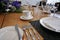 Restaurant table setup with cut flowers