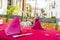 restaurant table on the street, white walls with floral balconies in Andalusia Spain