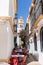 Restaurant tables in narrow alley Marbella old town