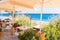 Restaurant terrace in front of the beach in kamari on the island of santorini