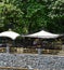 Restaurant terrace, by the river and parasols