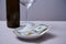 Restaurant tips or gratuity. Banknotes and coins on a plate