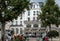 Restaurants with people dining outdoors on Place Chateaubriand in Saint Malo, Brittany, France