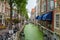 Restaurants, shopping tourists and houses right on the canal, th