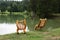 Resting chairs made of wood by the lake