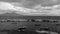 Restless Bay of Naples overlooking the Vesuvius and the beautiful boats in the foreground. Black and white