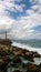 Restless rough sea with lots of waves and a famous lighthouse in city of Chania Crete, Greece