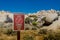 Restoration Area Sign with Desert Rocks