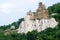 Restoration of christian church on stone rock mountain in the forest