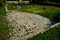 restoration of a pond with a stone wall buried under the terrain. fire tank