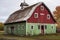 restored barn with a new roof and paint