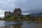 Restored medieval Eilean Donan castle in Kyle of Lochalsh, West Scotland