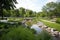 restored park, with greenery and wildlife visible, provides oasis of tranquility in busy city