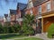 Restored Victorian brick row houses with gables