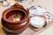 Restourant serving dish soup on wooden board on table