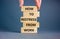 Restress from work symbol. Concept words How to restress from work on wooden blocks. Doctor hand. Beautiful grey background.