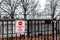 Restricted area warning sign on  fence surrounding the White House in Washington DC