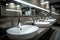 Restroom concept Modern public bathroom with row of white sinks