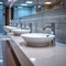 Restroom setting modern interior with a row of white ceramic sinks