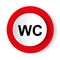 Restroom WC toilet sign. Round vector red icon.