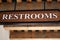 Restroom WC toilet wooden sign, street design