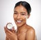 The results speak for themselves. Studio portrait of an attractive young woman posing with a container of face lotion