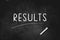 RESULTS written with chalk on blackboard icon logo design vector illustration