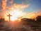 Resurrection of Jesus Christ concept: God Lamb in front of the cross of Jesus Christ on sunrise background