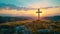 Resurrection symbol empty tomb and cross on meadow at sunrise for good friday concept