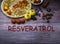 resveratrol rich food on wooden surface with text, antioxidants