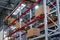 Retail Warehouse full of Shelves with Goods in Cardboard Boxes