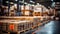 Retail warehouse full of shelves with goods in cartons, with pallets and forklifts. Logistics and transportation blurred