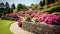 Retaining walls in beautiful home garden, landscaped yard of luxury villa in summer, scenery of upscale backyard with flowers and