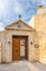 Rethymno ,Crete, Greece - March 07, 2020: View of Preveli monastery courtyard with the church of Saint John in Greece, Crete