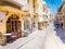 Rethymno, Crete, Greece - Tourist souvenir shops with handicrafts in a narrow street.