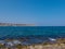 Rethymno, Greece - July 29, 2016: Rocky mediterranean beach