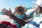 Retired african american senior couple sitting on folding chairs talking at beach during sunny day