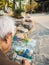 Retired Asian man paint a traditional temple