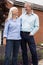 Retired Couple Standing Outside Home