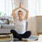 Retired elderly female enjoy personal fulfillment, yoga at home, wellness at home