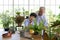 The retired grandfather spent the holidays with his grandson taking care of the indoor garden