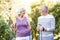 Retired man and woman smiling at each other in love