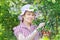 Retired older woman picking mespilus